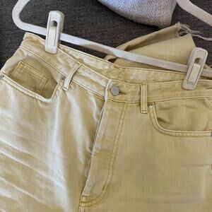 COS distressed light yellow mom jeans
